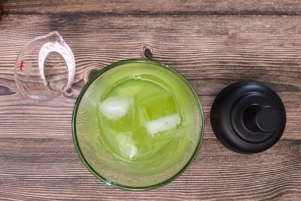 add all green apple margarita ingredients into your shaker
