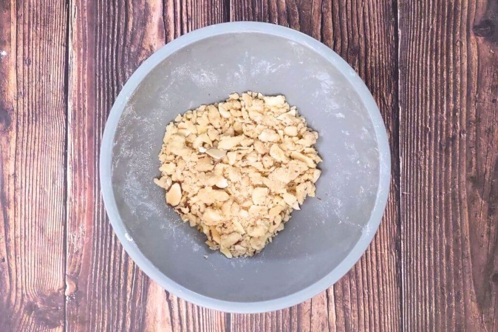 in a small bowl make the crumble mixture with brown sugar, flour, and cold butter cubes