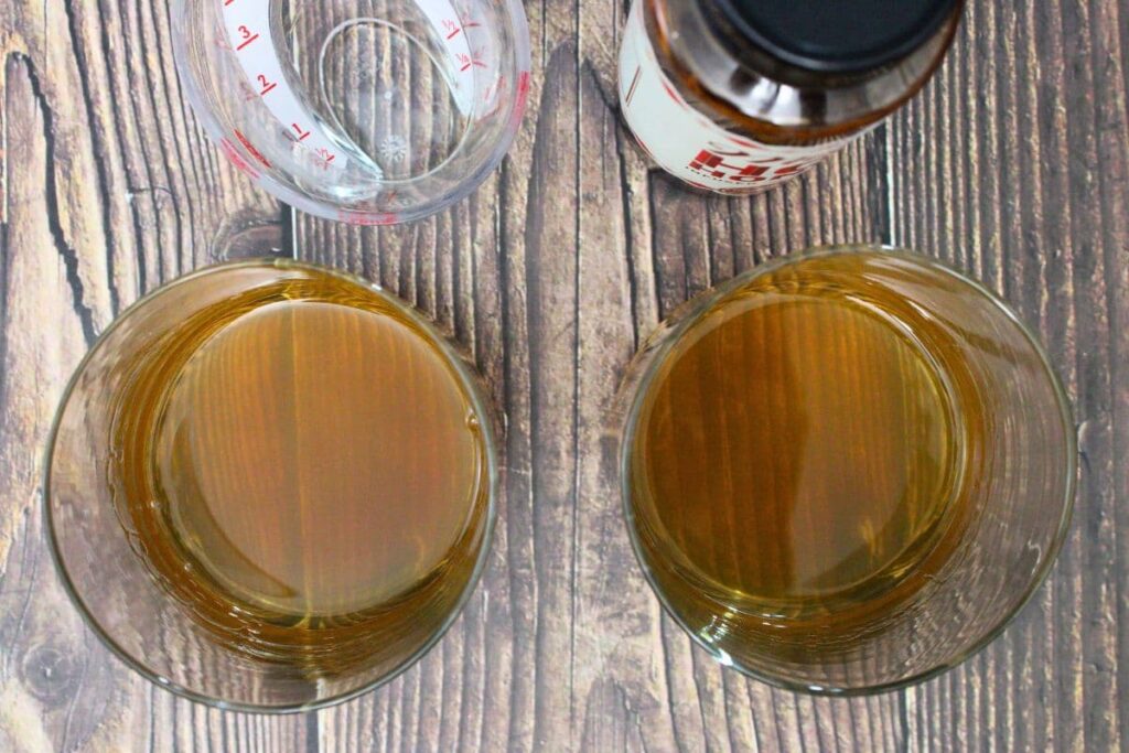 add bourbon and honey to glass and stir until honey dissolves