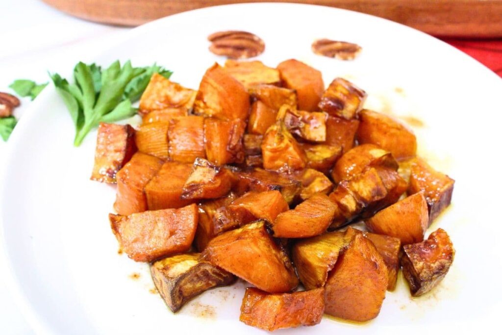 closeup view of air fryer candied yams on a plate