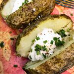 easy microwave backed potato in plastic wrap featured image