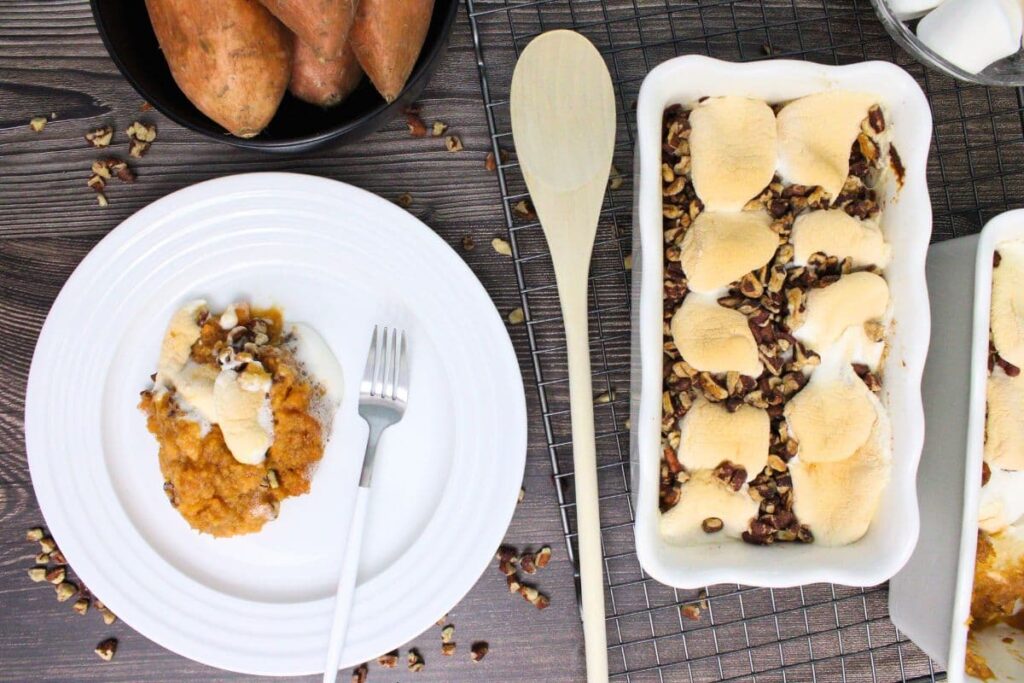 overhead view of air fryer sweet potato casserole scooped out on a plate