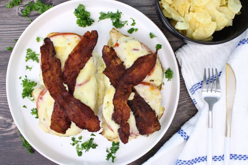 overhead view of two air fryer hot brown sandwiches on a plate