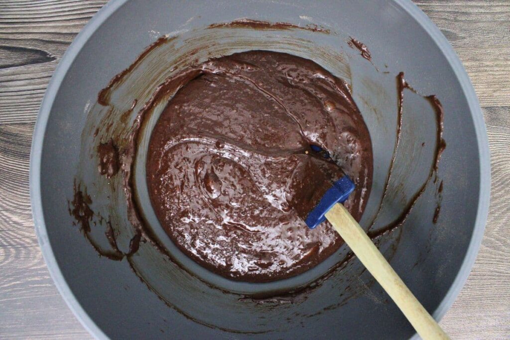 add flour, cocoa powder, and salt then stir in the wine chocolate