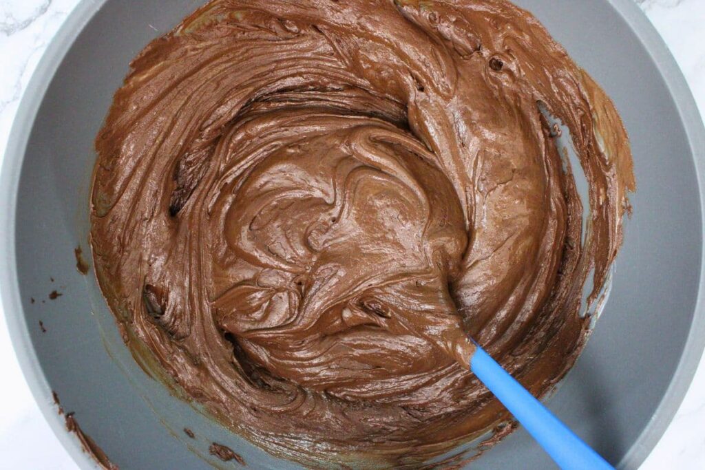 combine the melted chocolate chips and liquified frosting