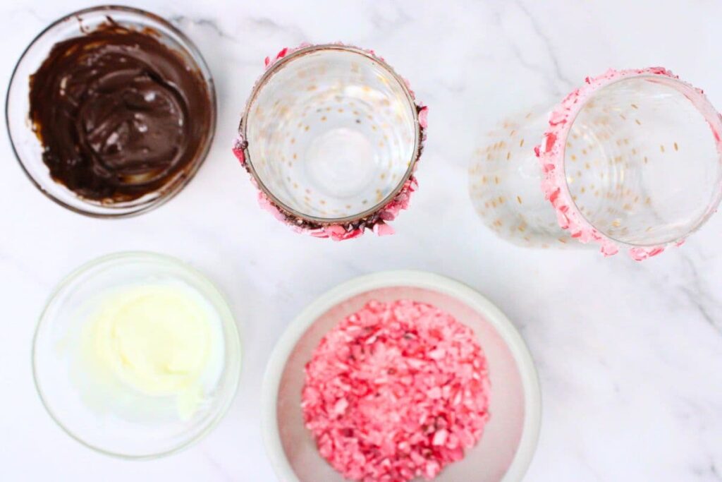 optionally rim the glasses with melted chocolate and crushed candy cane pieces