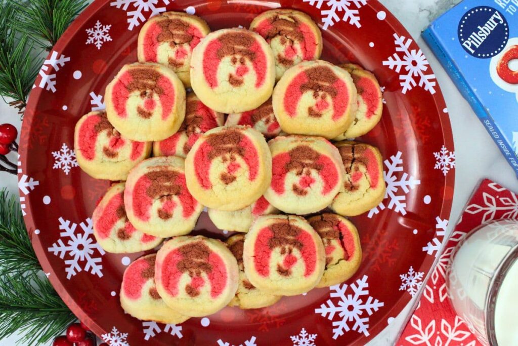 overhead view of air fryer pillsbury sugar cookies piled up on a plate