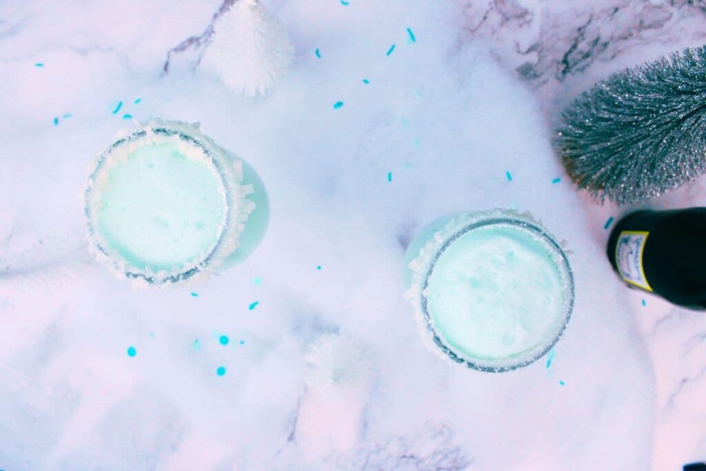overhead view of jack frost mimosas surrounded by fake snow