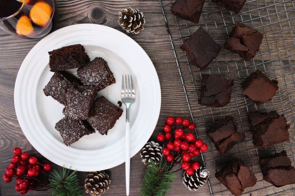 overhead view of mulled wine brownies on a plate and wire rack