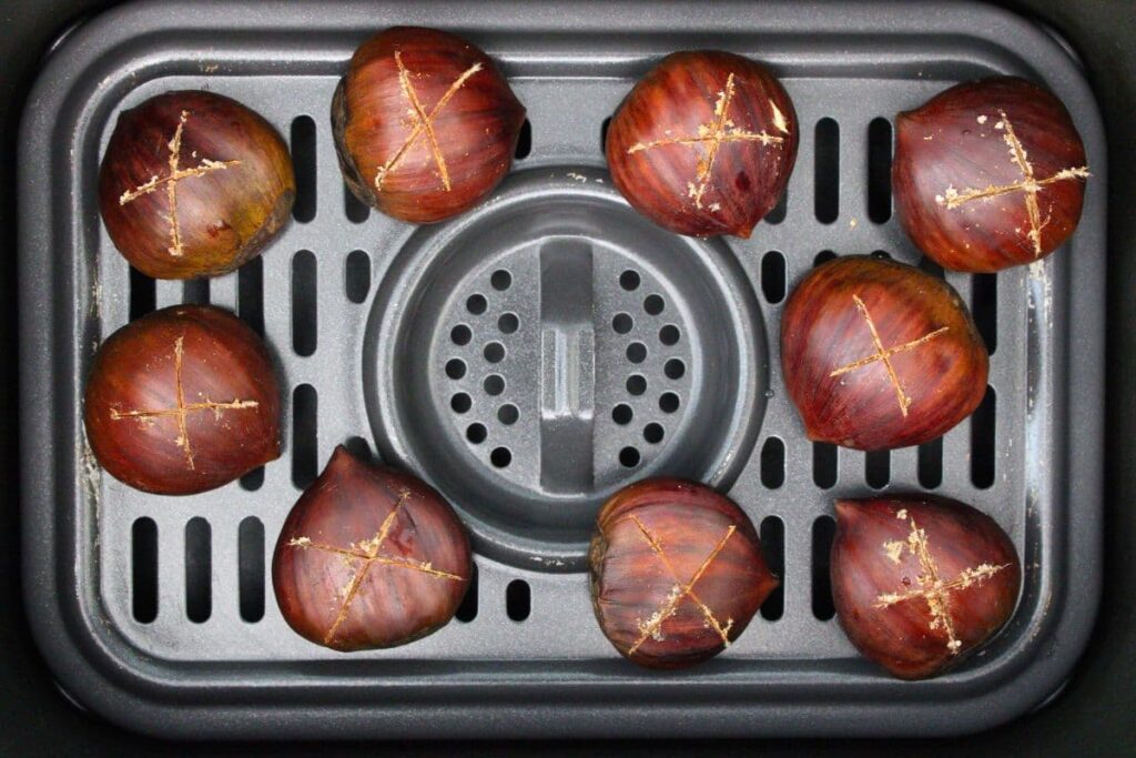 place scored chestnuts in air fryer basket