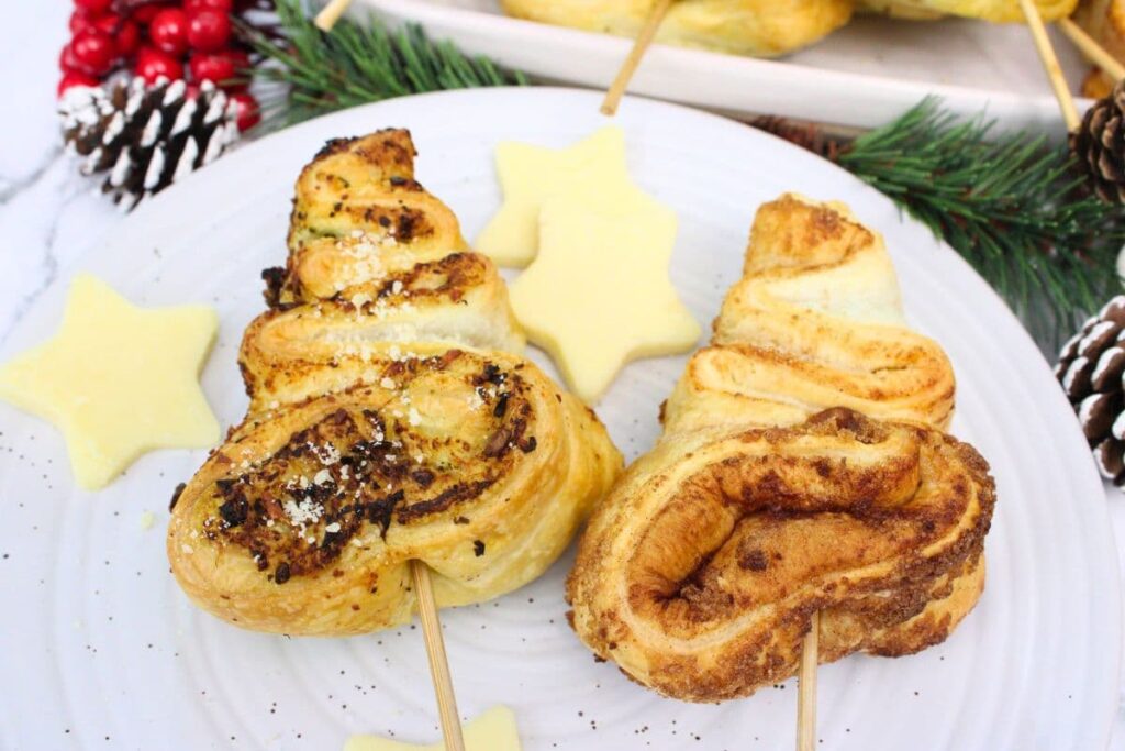 savory and sweet mini puff pastry christmas trees on a plate