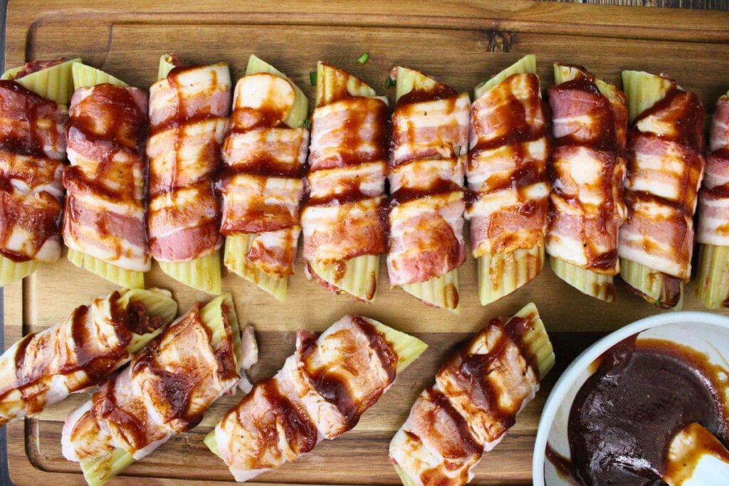 brush the bacon wrapped shells with barbecue sauce mixture