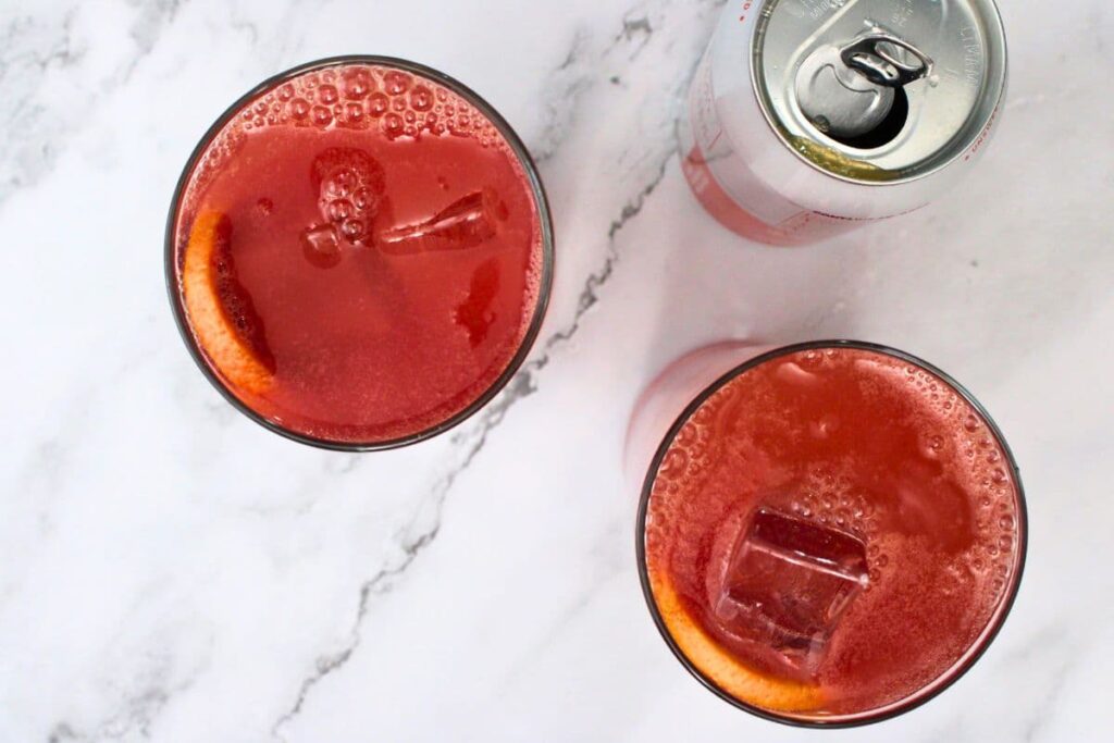 fill the glass with ice and top with blood orange sparkling water