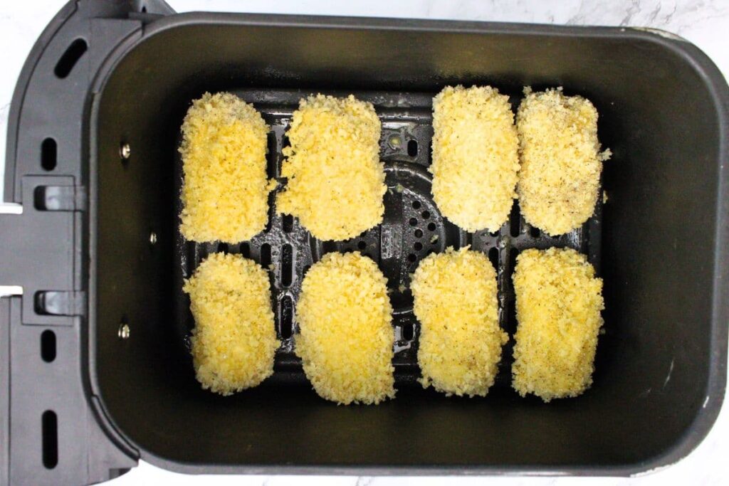 place chicken croquettes in air fryer basket