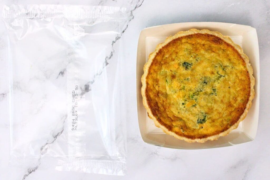 remove quiche from plastic wrapping but leave in tray