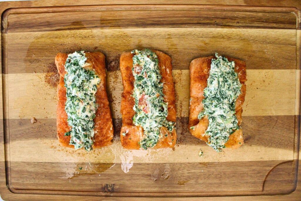 place the cheese mixture into the slices of the salmon