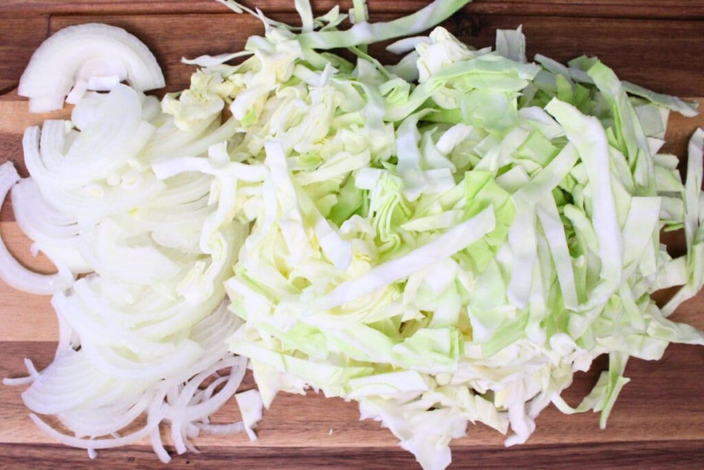 shred your cabbage and thinly slice the onion