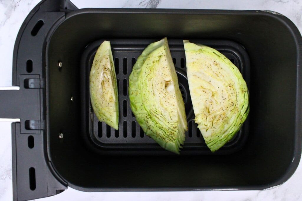 place cabbage wedges in air fryer basket