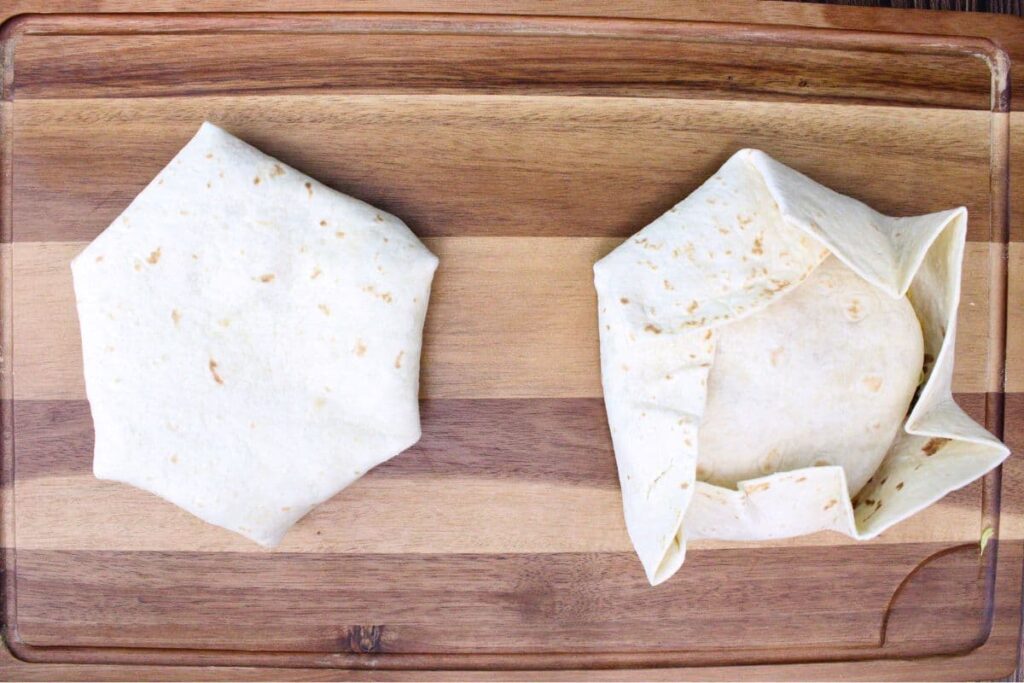 carefully wrap large tortilla up around the sides