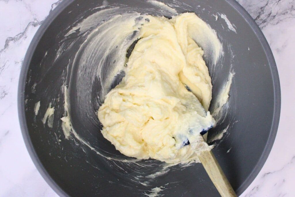 combine softened cream cheese, granulated sugar, and vanilla in a bowl