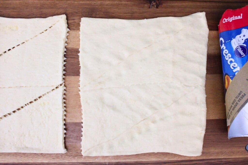 roll out crescent dough and pinch seams together to form a sheet