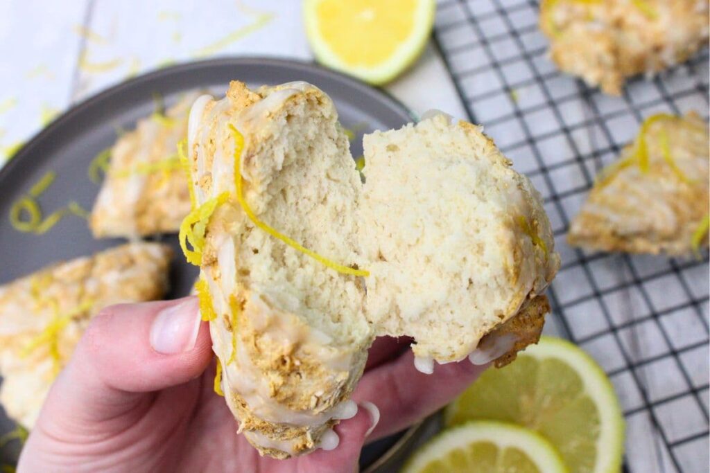 holding up a split in half air fryer lemonade scone