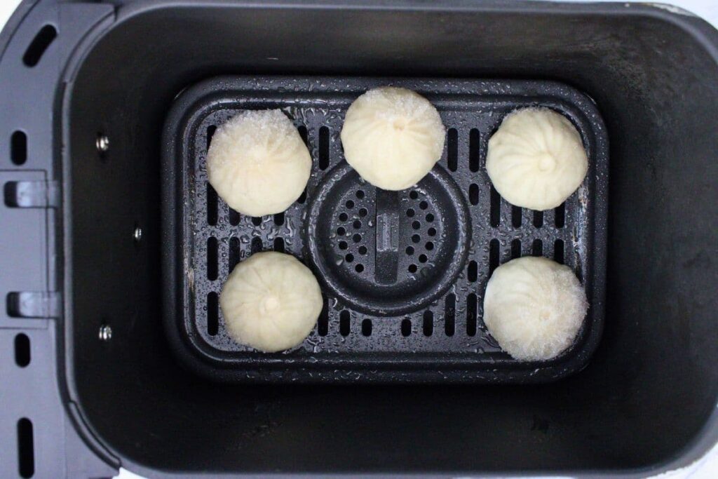 place frozen aldi momo in the air fryer basket