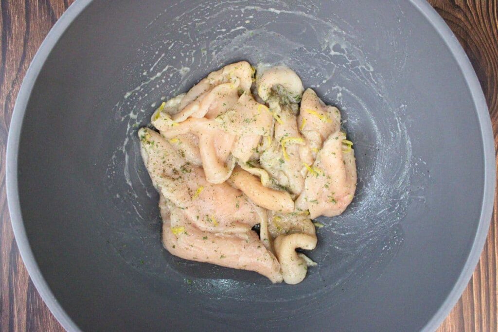 toss thin cut chicken breasts in olive oil, lemon juice, lemon zest, salt, pepper, and parsley