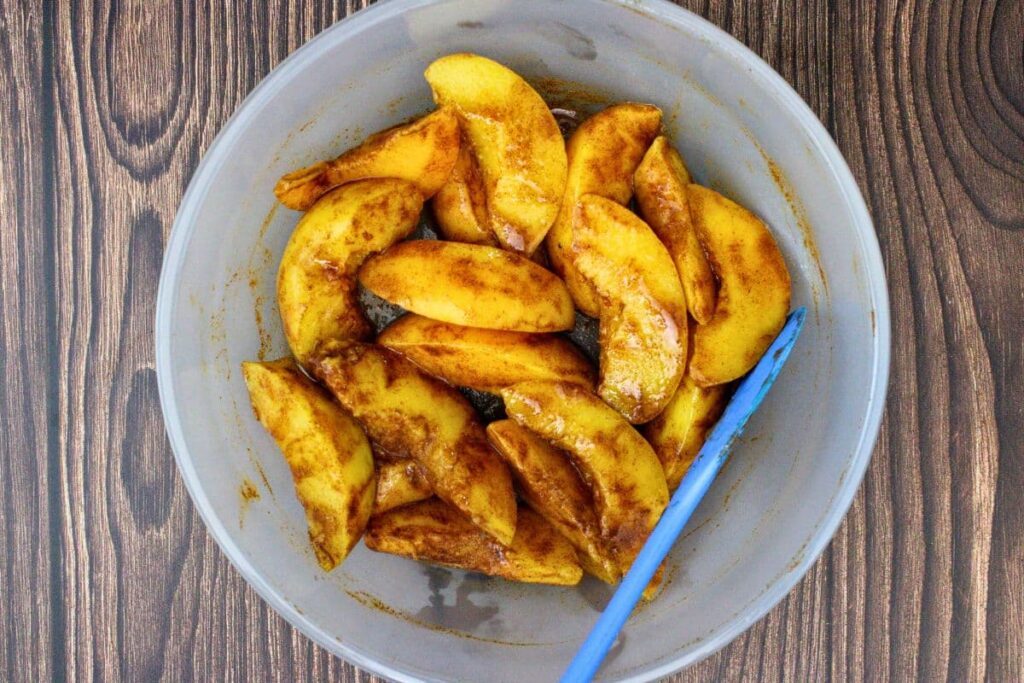 add drained peaches, vanilla, and cinnamon to a microwave safe dish