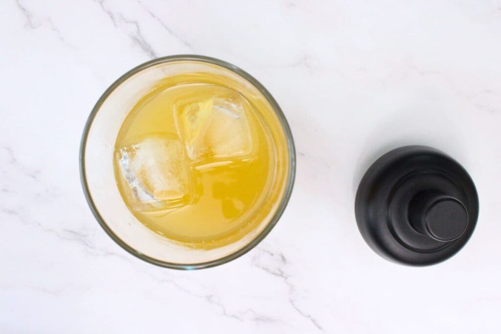 add tequila, crown peach, triple sec, lime juice, and peach juice to a cocktail shaker