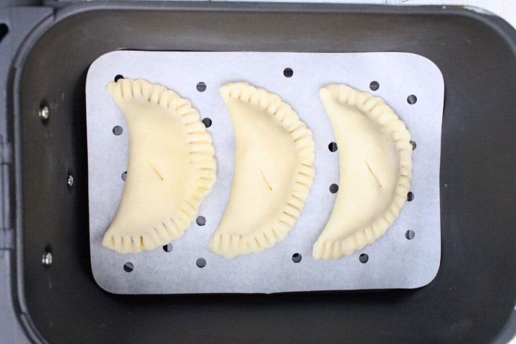 place peach hand pies in preheated air fryer basket