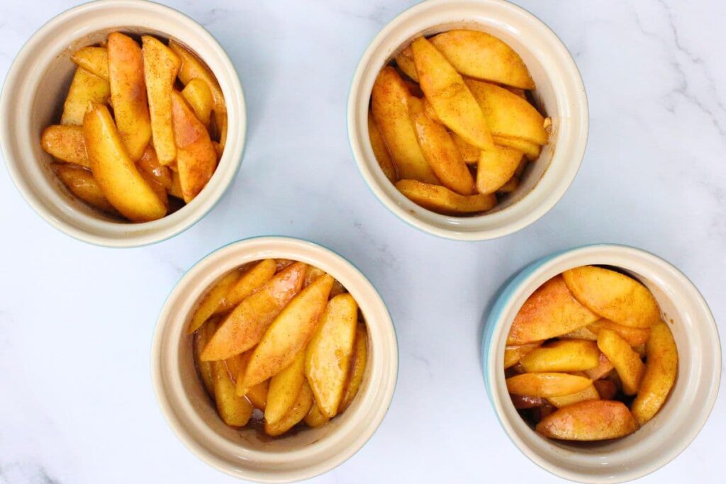 add peach, cinnamon, lemon juice, cornstarch, and brown sugar mixture to serving containers