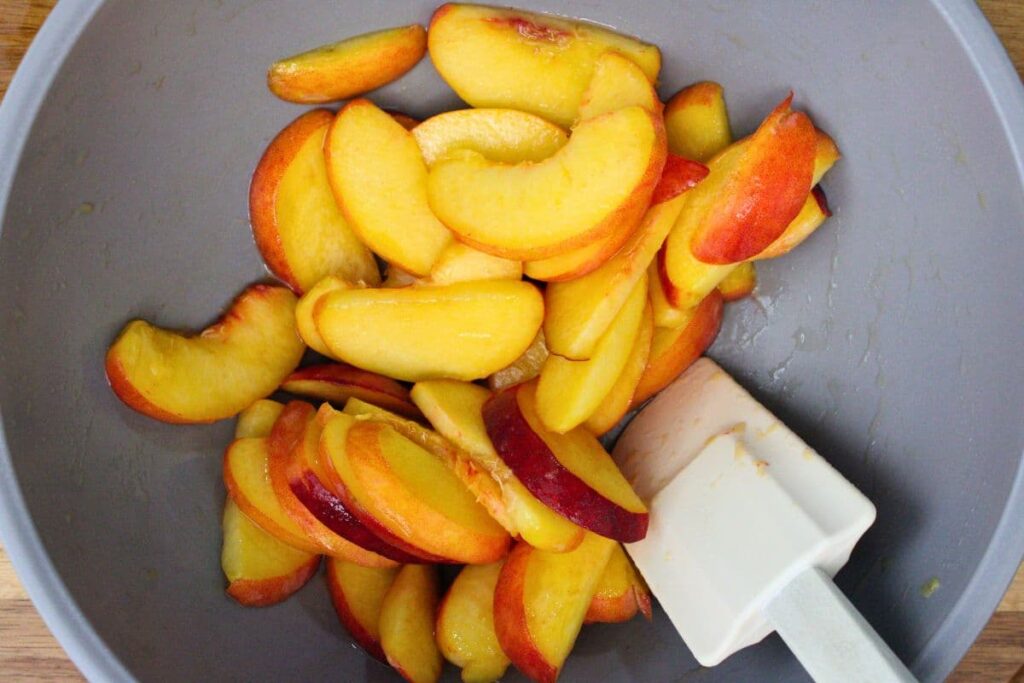 toss peach slices with vanilla, lemon juice, and a pinch of salt