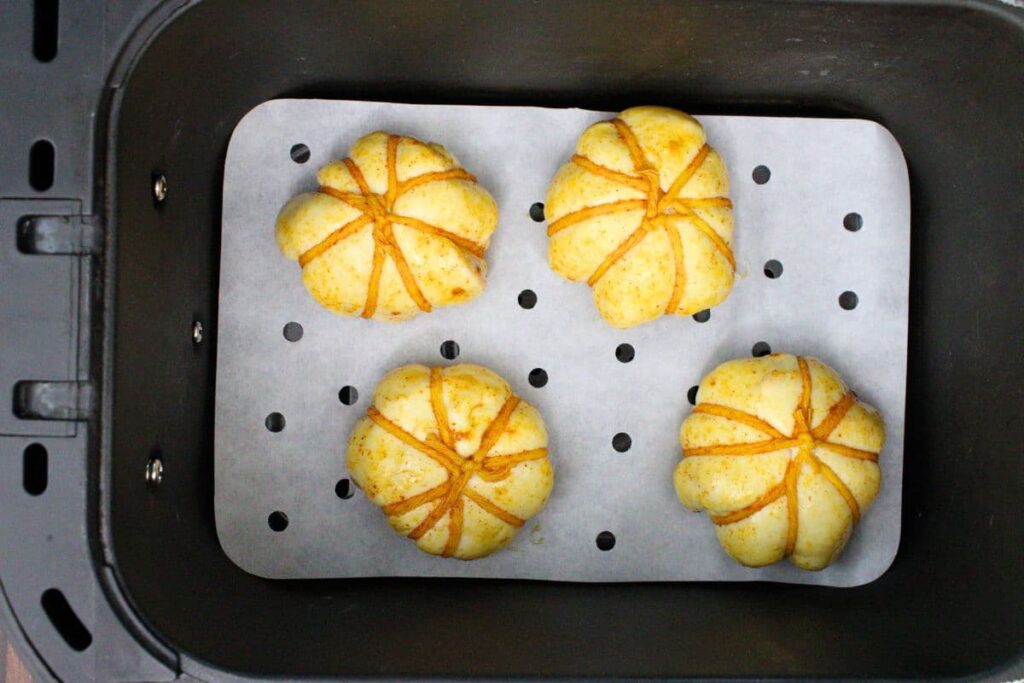 place pizza pumpkins in air fryer basket