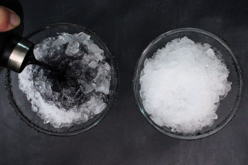 shake and strain black margarita into prepared ice filled glasses