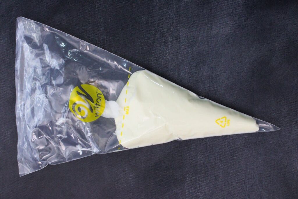 transfer melted white chocolate into a candy piping bag