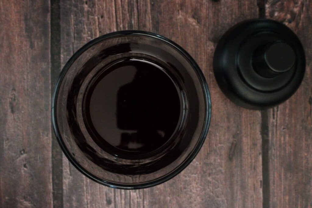 add whiskey, fig preserves, and pomegranate juice to cocktail shaker
