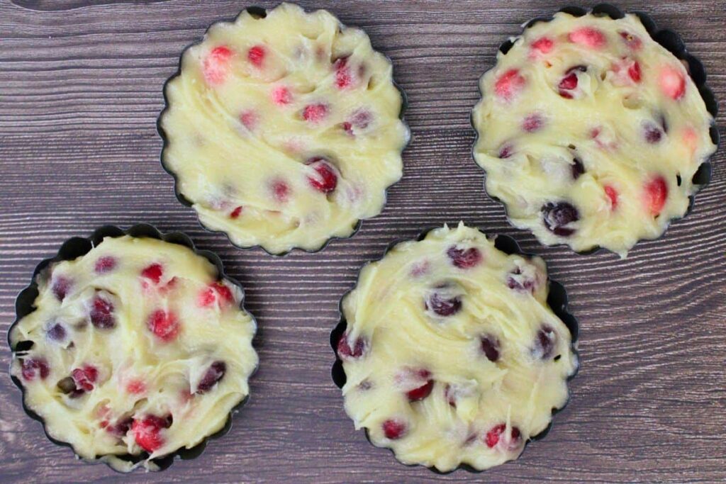 add cranberry batter to mini tart pans