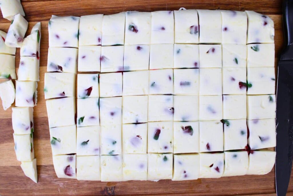 cut cold nougat into one inch squares