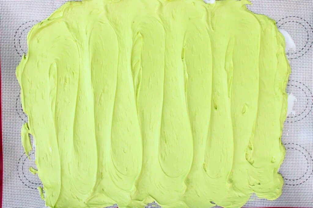 pour green chocolate layer over the white