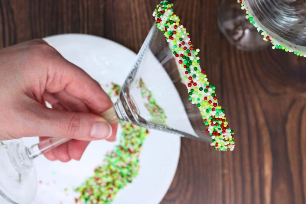rim martini glass with frosting and sprinkles