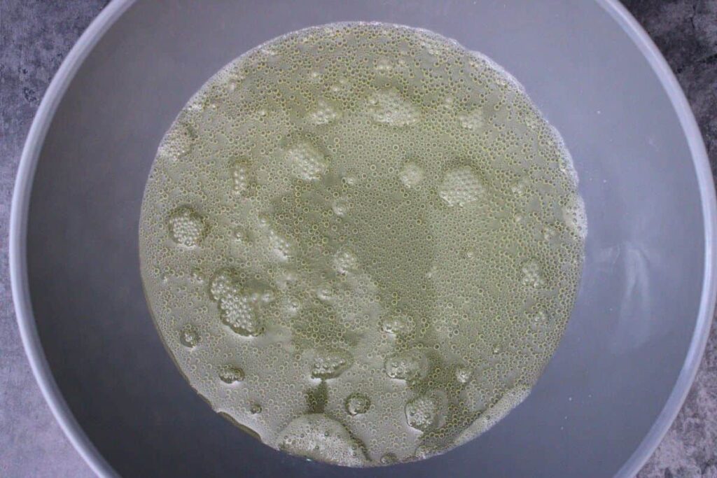 add champagne to a microwave safe boil and heat until boiling