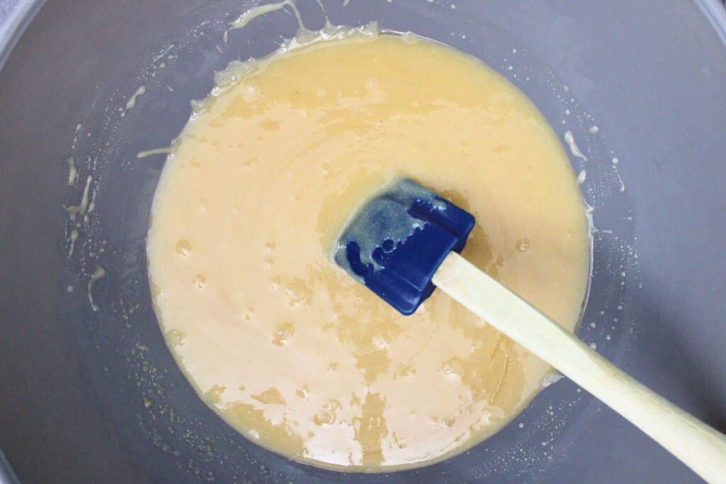 add corn syrup, white sugar, brown sugar, and sweetened condensed milk to butter