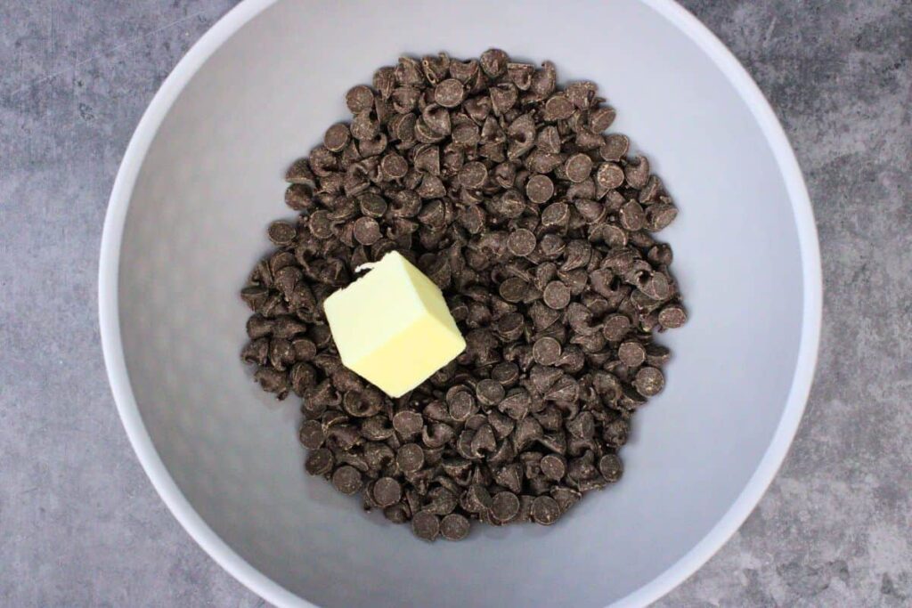 add semisweet chocolate and butter to microwave safe bowl