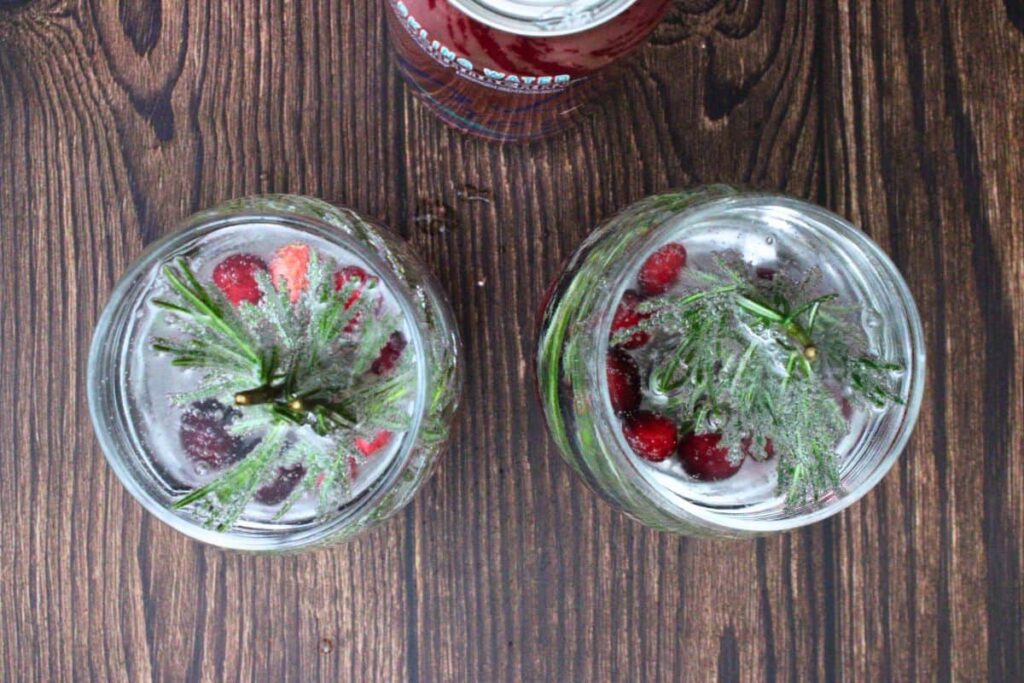 add snow globe cocktail liquor and sparkling water