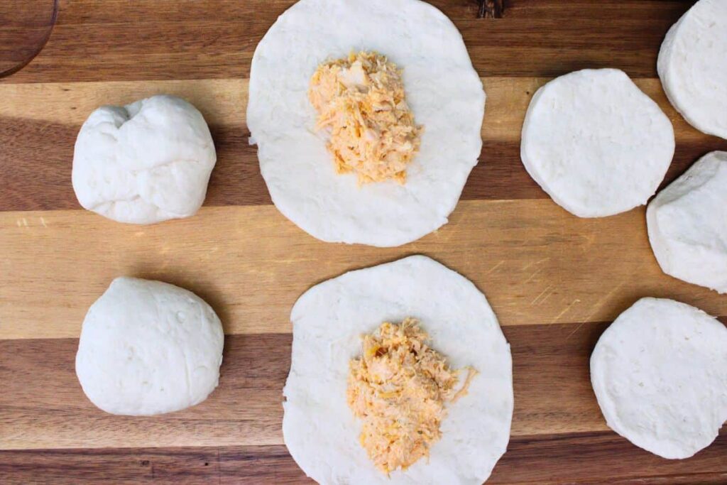form a ball over the buffalo chicken mixture