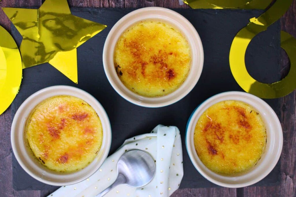 overhead view of three single serve ramekins with air fryer creme brulee