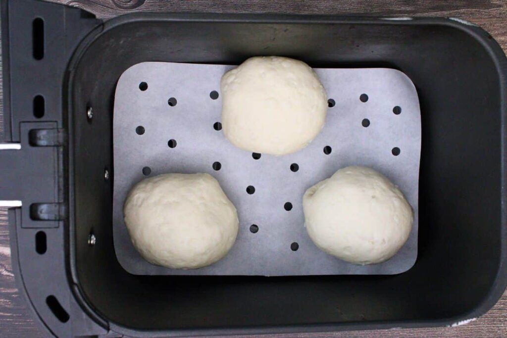 place buffalo chicken bombs in air fryer basket