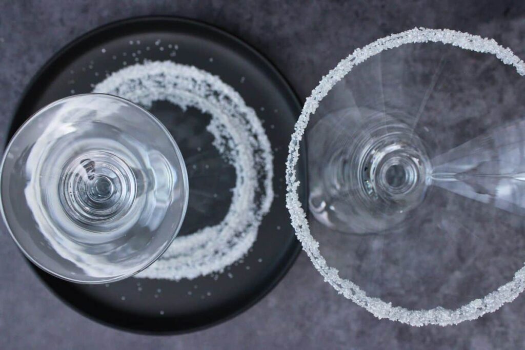 rim christmas martini glass with syrup and sugar