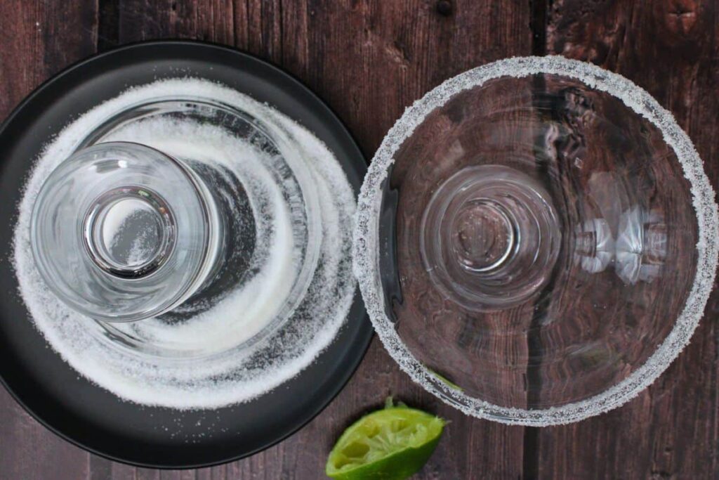 rim mistletoe margarita glass with lime and sugar